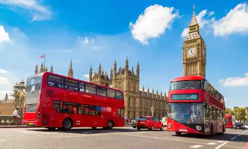 London big Ben and two red double deck busses
